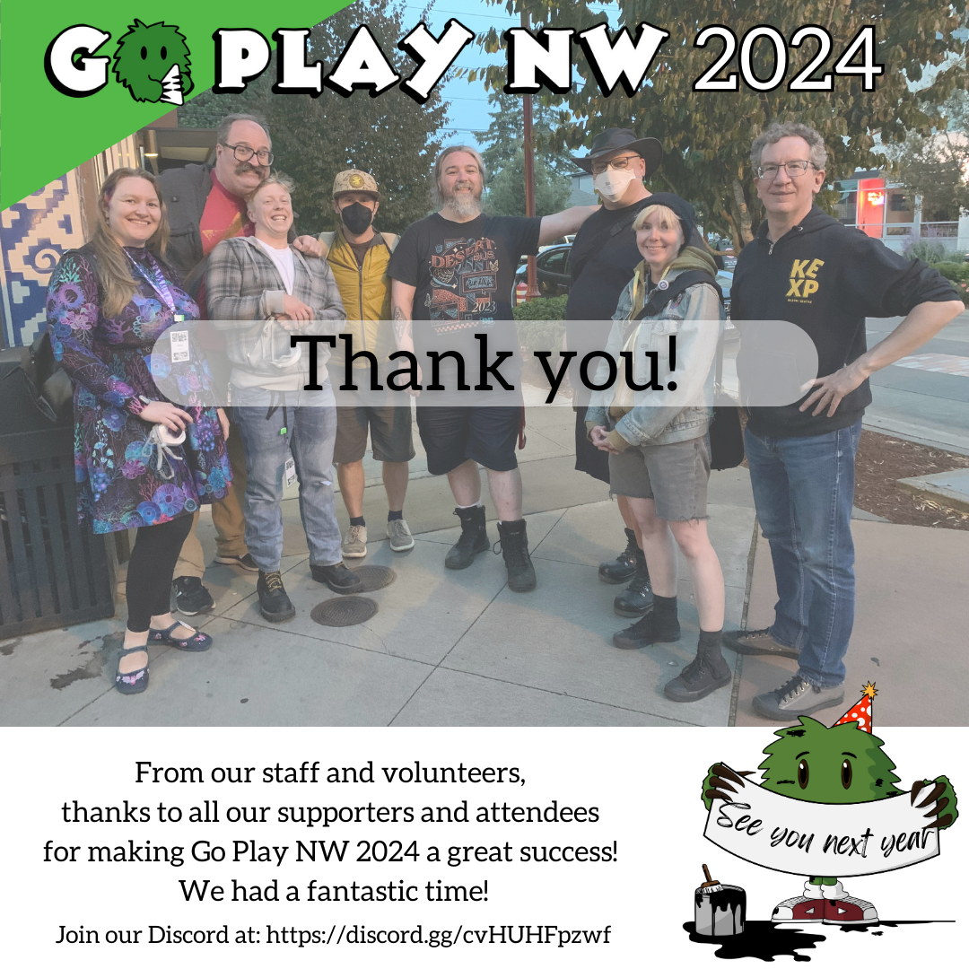 A photo of the staff and volunteers for Go Play NW 2024, outside the Centilia Cultural Center on Sunday evening after the event finished. Text below the photo states “From our staff and volunteers, thanks to all our supporters and attendees for making Go Play NW 2024 a great success! We had a fantastic time!” In the bottom-right corner our monster mascot Go, with some stains of black paint and wearing a party hat, stands by a can of black paint (with paint pooled on the ground) and holds a hand-painted banner that reads “See you next year”